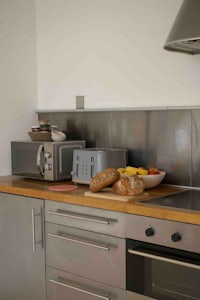 a kitchen with a microwave oven and a toaster